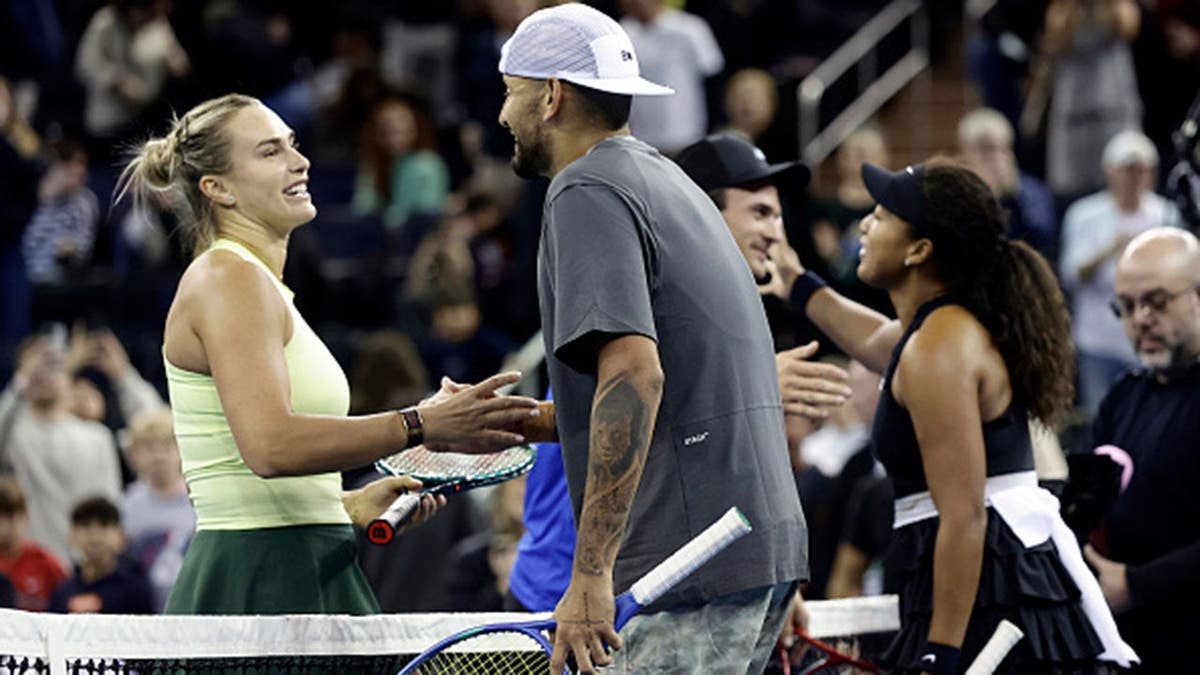 Aryna Sabalenka and Tommy Paul congratulate Naomi Osaka and Nick Kyrgios after winning a mixed doubles match.