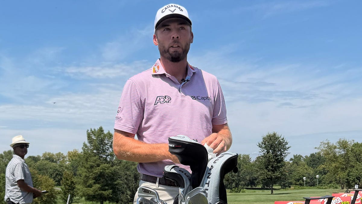 PGA Tour golfer Sam Burns speaking to local kids during a promotional golf event in St. Louis.