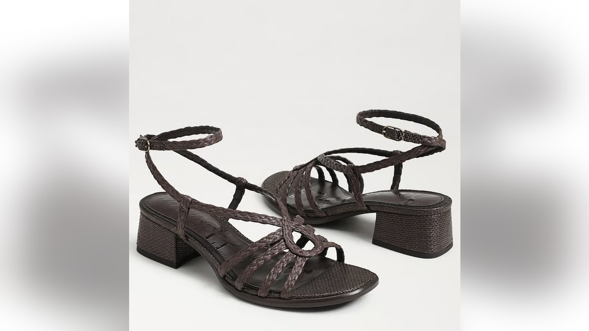 The dark color of these strappy heels works well into fall.