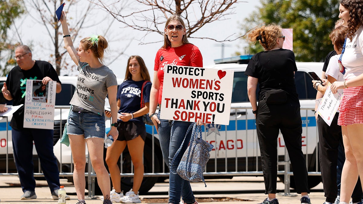 Sophie Cunningham supporter carries a sign