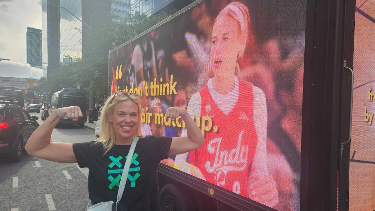 Canadian powerlifting champ April Hutchinson celebrates Sophie Cunningham in Toronto.