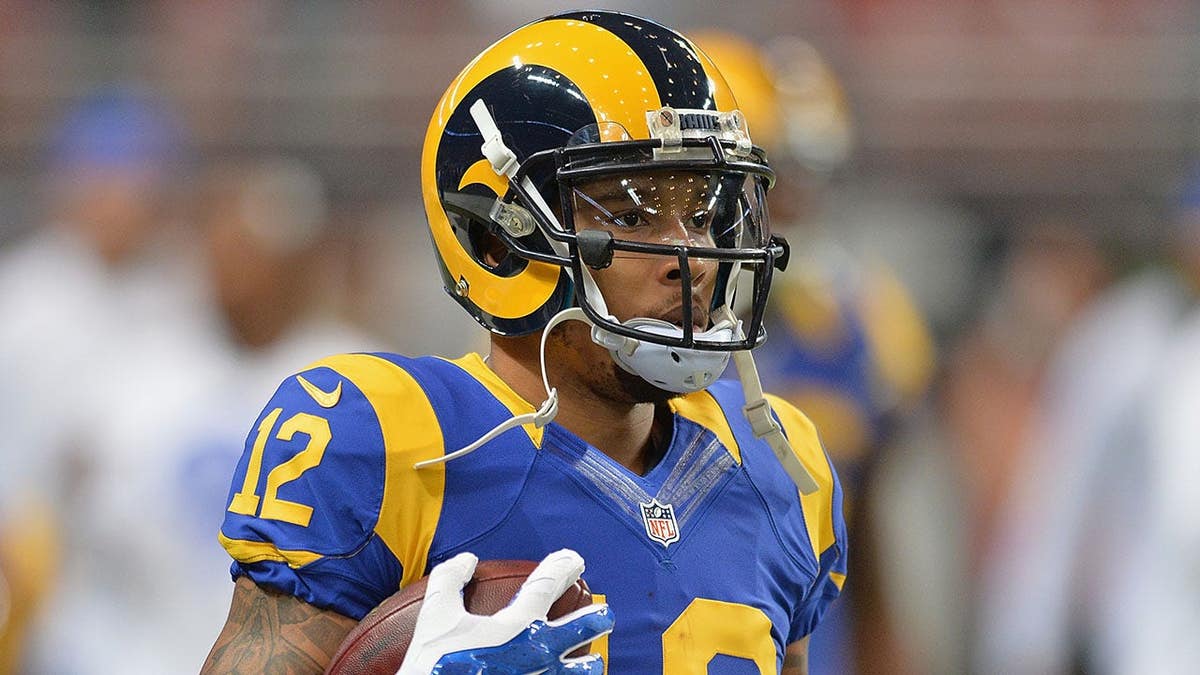 Stedman Bailey stands on the field in uniform before a game.
