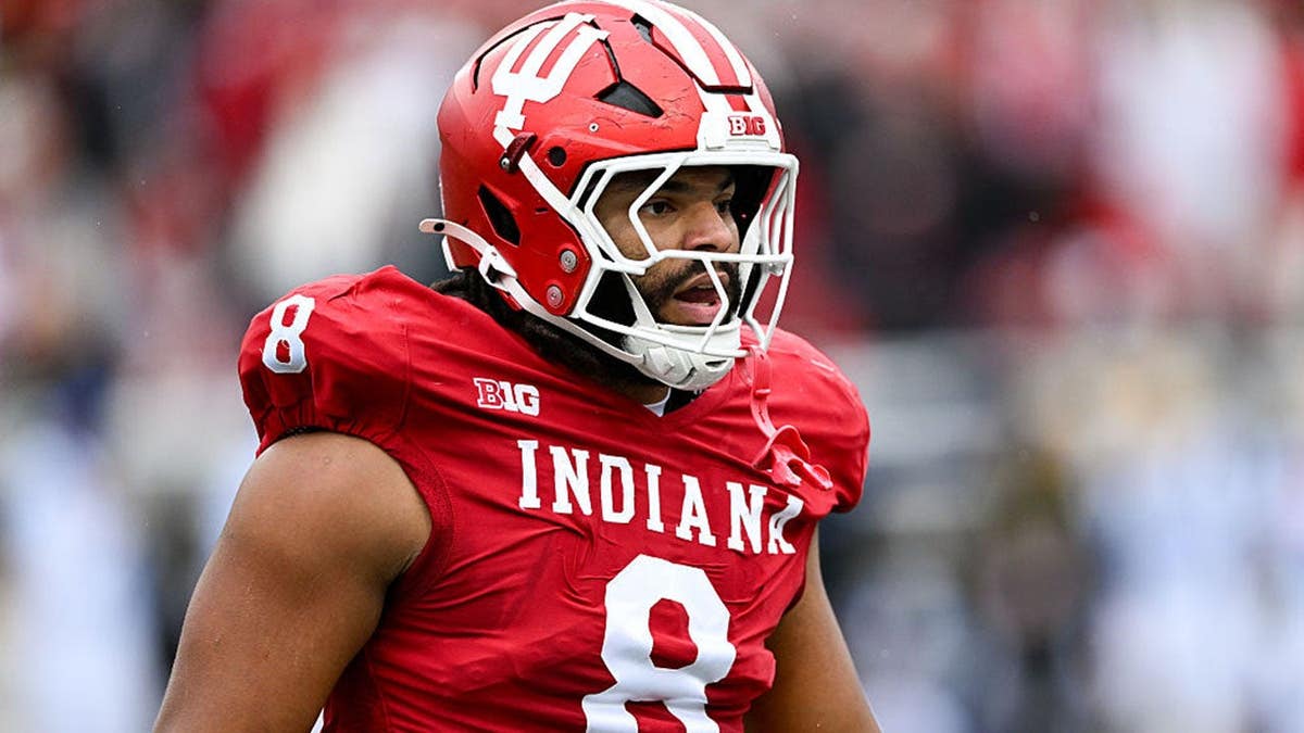 Stephen Daley, Indiana Hoosiers defensive lineman, stands during a college football game.