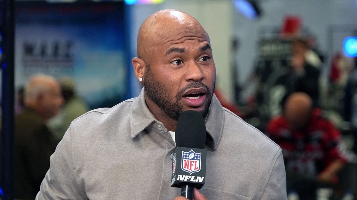 Steve Smith Sr. sits on the NFL Network set during Super Bowl LX media coverage.
