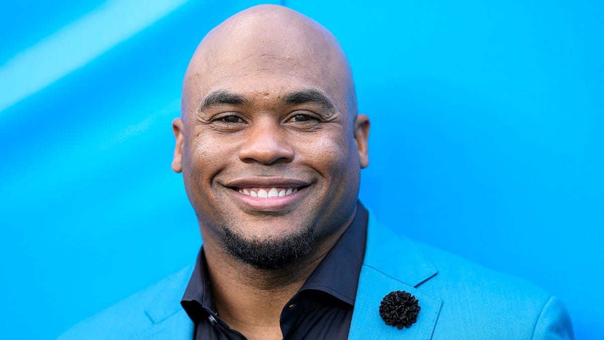 Steve Smith Sr. stands before a game at Bank of America Stadium.