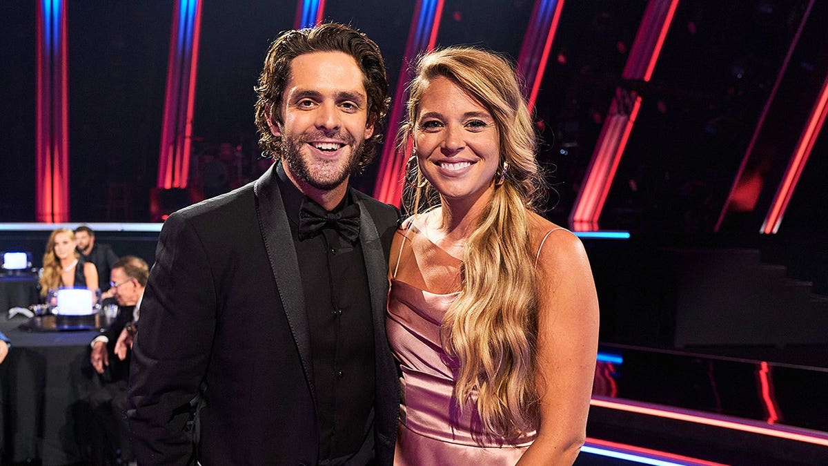 Thomas Rhett and Lauren Akins attend the CMA Awards in Nashville.