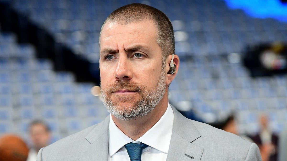 Tim MacMahon looks on before Game 1 of the 2025 NBA Finals.