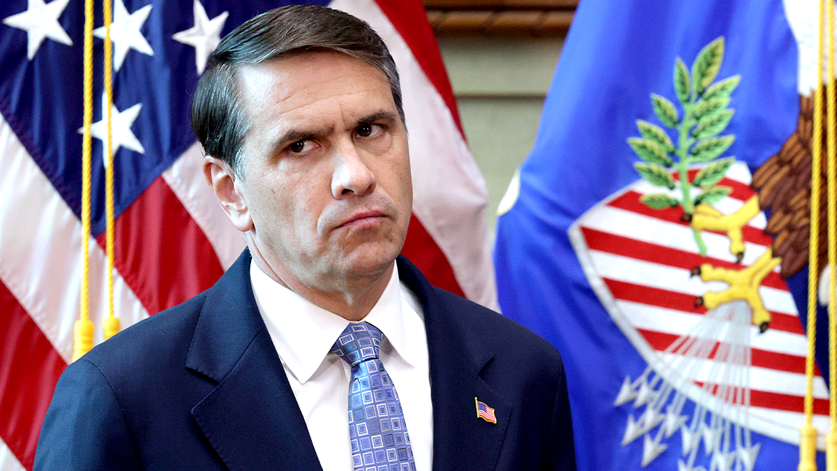 Attorney General Todd Blanche listens during Justice Department news conference.