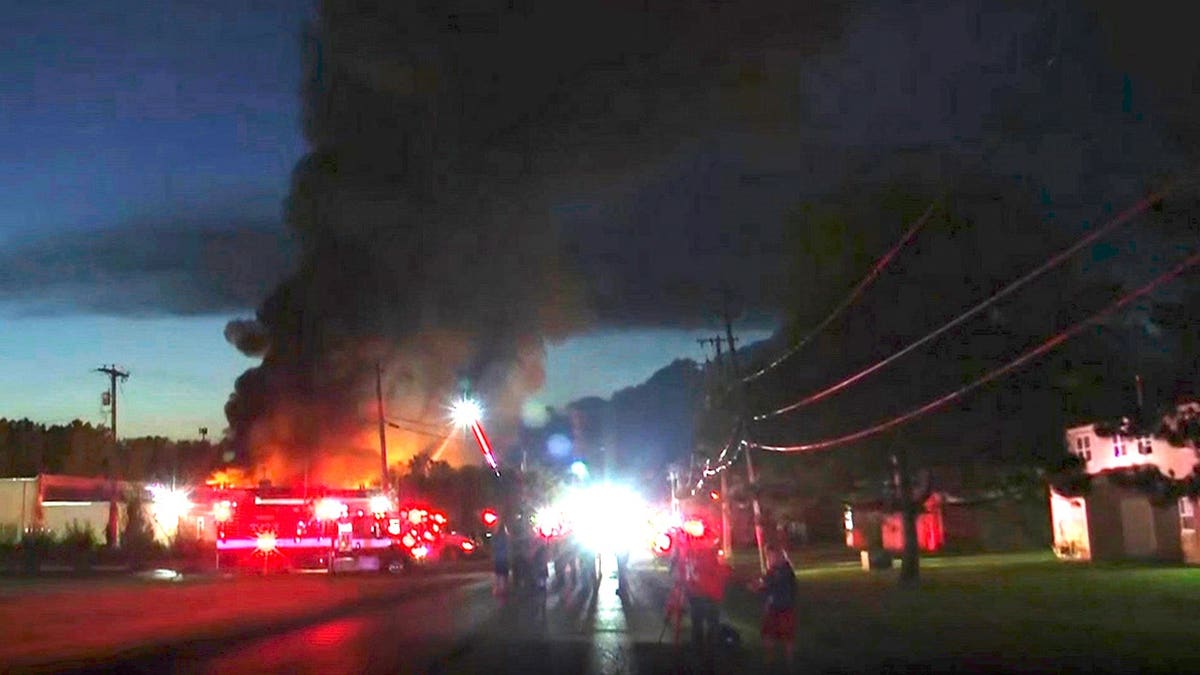Firefighters work at the scene after an explosion in Toledo, Ohio.