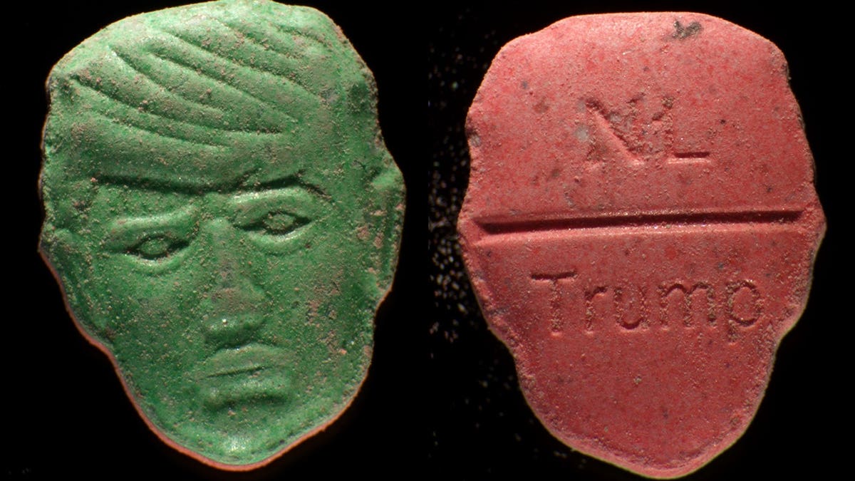 Pills with President Donald Trump depicted on one side and NL and Trump stamped on the other.