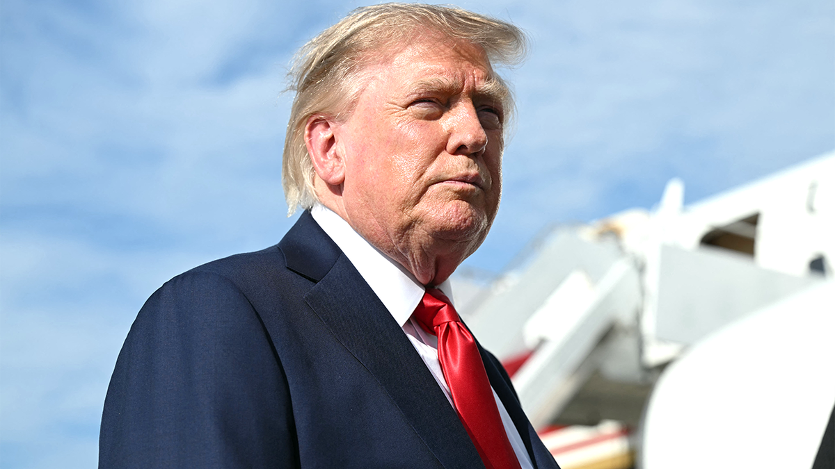 President Donald Trump speaks to reporters at Joint Base Andrews.
