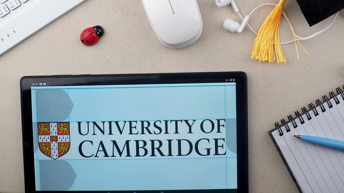 University of Cambridge logo on a tablet