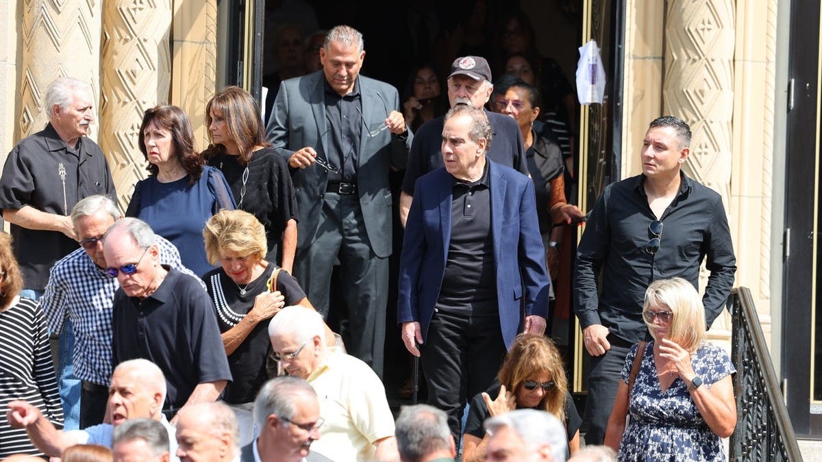 Mourners gather at Vincent Pastore's funeral in New York.