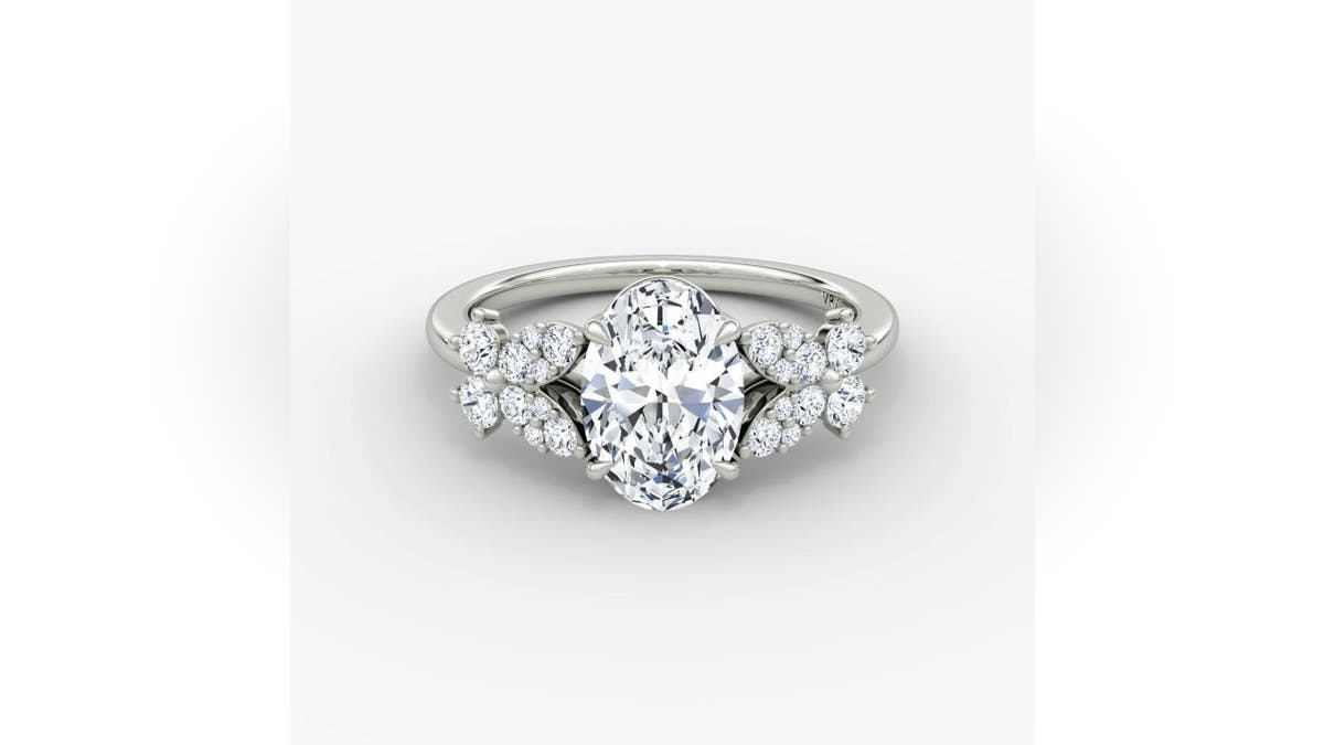 Petal-like diamond clusters give this ring a floral look.