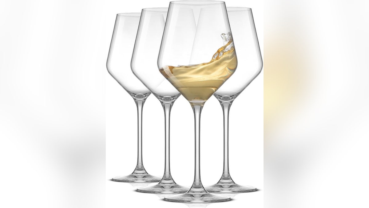 Upgrade your home bar with this set of four white wine glasses.