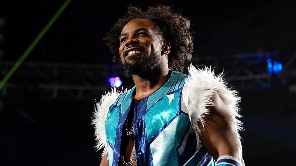 Xavier Woods looks on during his entrance at WWE Monday Night RAW in St. Paul, Minn.