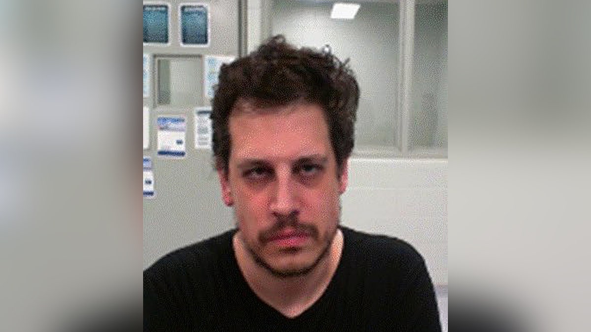 Milo Yiannopolous booking photo