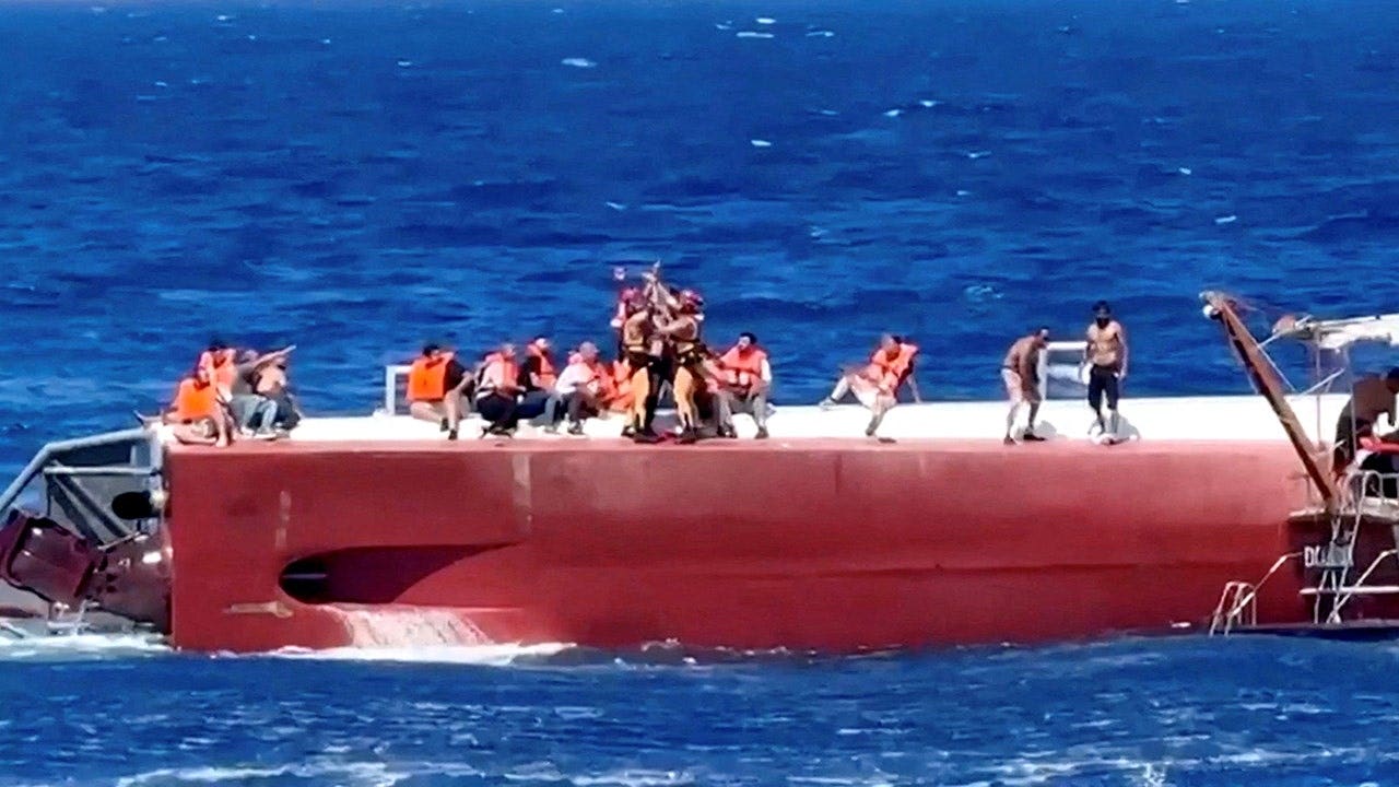 Search continues for 20 missing after ferry capsizes off Cyprus killing at least eight; mother recounts losing grip on daughter