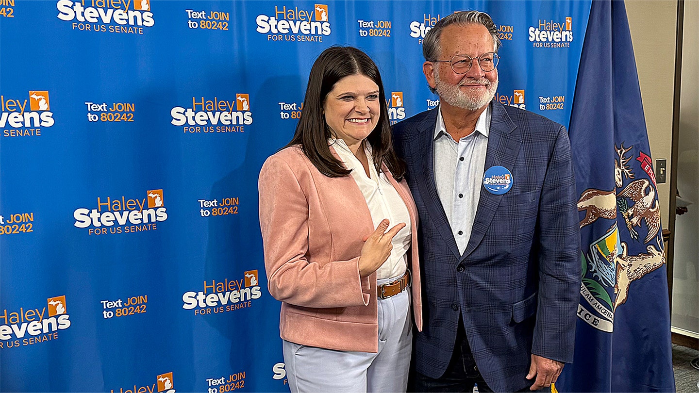 Haley Stevens and Gary Peters take questions from the press