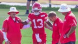 Cyrus Allen is helped up during a training camp practice