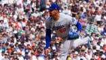 Edgardo Henriquez throws a pitch during a Dodgers game