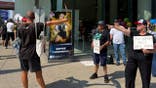 protesters and counter-protesters clash outside Target Center in Minneapolis