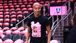 Angel Reese warms up before a game in Atlanta.