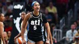 Angel Reese reacts during a WNBA game between the Indiana Fever and Atlanta Dream.