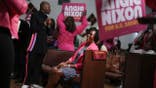 Angie Nixon participates in a worship service at Ebenezer Missionary Baptist Church.