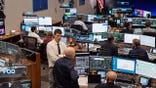Flight controllers monitor the Artemis II Orion spacecraft in the White Flight Control Room at NASA Johnson Space Center.