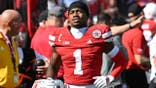 Ceyair Wright stands on the field before a game at Memorial Stadium.