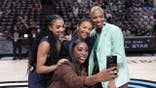 Chiney Ogwumike, Andrea Carter, Malika Andrews and Monica McNutt take a selfie before the WNBA All-Star game.