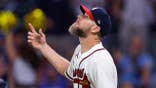 Chris Sale reacts after the Braves defeated the Dodgers