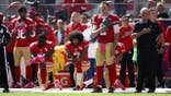 Colin Kaepernick kneels for the national anthem before a game at Levi's Stadium.