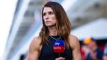 Danica Patrick stands in the paddock during F1 Sprint qualifying at Circuit of The Americas.