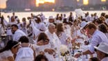People partake in Dîner en Blanc in New York City.
