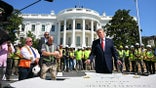 US President Donald Trump speaks to the press after signing a piece of stone at the construction site of a helipad on the South Lawn of the White House in Washington, DC, on August 19, 2026. (Photo by Jim WATSON / AFP)