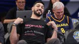 Enes Kanter Freedom poses courtside prior to a Chicago Sky and Indiana Fever game.