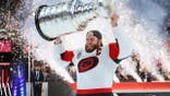 Eric Staal lifting Stanley Cup
