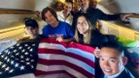 Former U.S. Marine Robert Gilman on the return flight home from Russia on Aug. 11, 2026.