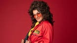 Hannah Dasher in red jacket smiling