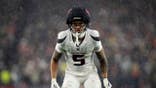 Jalen Pitre #5 of the Houston Texans lines up during a playoff game.