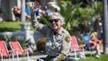 San Diego County Sheriff Kelly Martinez waves while riding in the Independence Day Parade in Coronado, California.