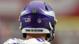 Kirk Cousins' helmet displays an END RACISM sticker.