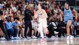 Indiana Fever All-Star Caitlin Clark celebrates after scoring vs. the Chicago Sky at United Center.