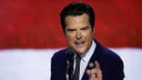 U.S. Rep. Matt Gaetz walks on stage at the Republican National Convention.