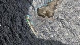 Satellite image shows crude oil spreading from grounded tanker Caroline Bezengi off Oman coast.