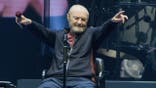Phil Collins performs on stage at the United Center.