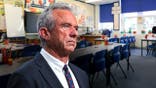 RFK Jr. overlaid on preschool classroom image.