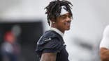 Tank Dell stands during Houston Texans training camp.